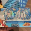 PolkaDot Magic Mushroom Belgian Chocolate Bar Frosted Flakes. This product is a delightful fusion of rich chocolate and the natural goodness of mushrooms. Indulge in the unique taste and texture of this delectable treat that will leave your taste buds craving for more.